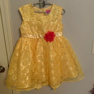 Disney's Princess line of dresses yellow with pink flower